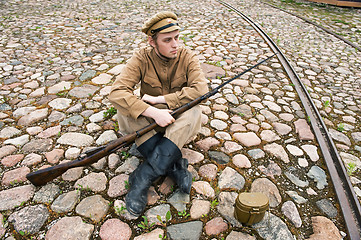 Image showing Soldier with boiler and gun in retro style picture