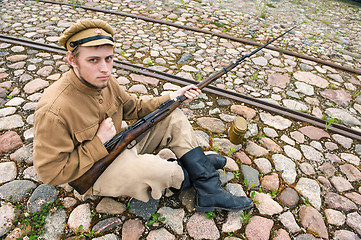 Image showing Soldier with boiler and gun in retro style picture