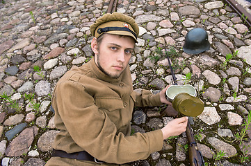 Image showing Soldier with boiler and gun in retro style picture