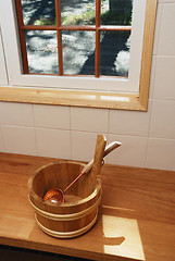 Image showing bathing wash-tub and a scoop