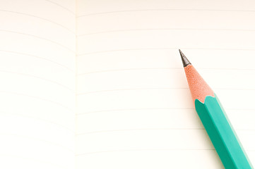 Image showing pencil and blank notebook