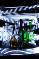 Image showing empty bottles in the night