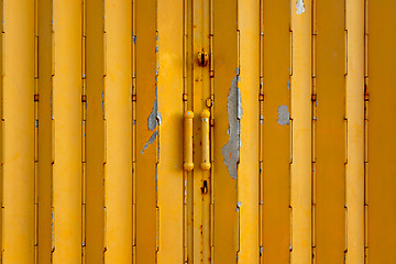 Image showing yellow metal gate