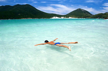 Image showing Swimming in crystalline clear waters in Arraial do Cabo, Rio de Janeiro, Brazil