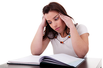 Image showing woman studying with headache 