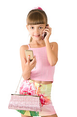 Image showing The girl with a pink handbag