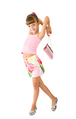 Image showing The girl with a pink handbag