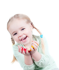 Image showing Little girl playing with colors