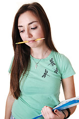 Image showing Schoolgirl with notebook.