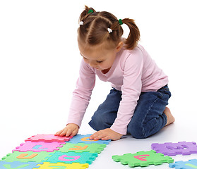 Image showing Little girl with alphabet