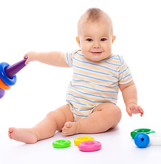 Image showing Little boy play with toys