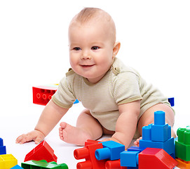 Image showing Little boy with building bricks