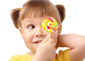 Image showing Little girl with lollipop