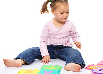 Image showing Little girl with alphabet