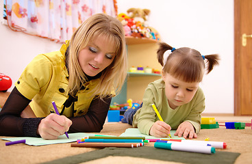 Image showing Teacher with child in preschool