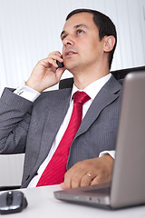 Image showing Mature businessman working
