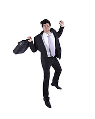 Image showing Happy businessman jumping
