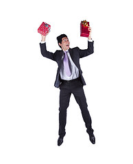 Image showing Happy businessman with christmas presents