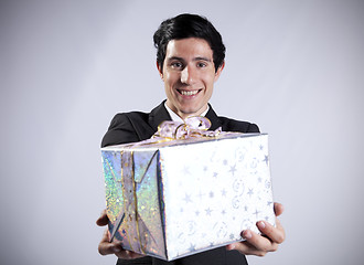 Image showing Businessman with a gift package