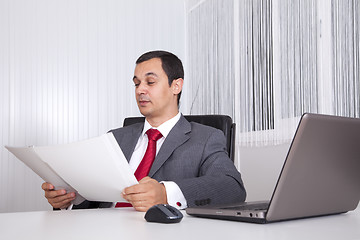 Image showing Mature businessman working