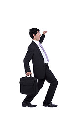 Image showing Businessman walking step by step