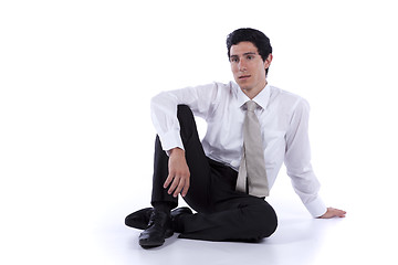 Image showing Businessman sitting on the floor