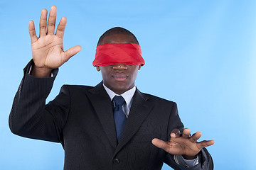 Image showing blindfold african businessman