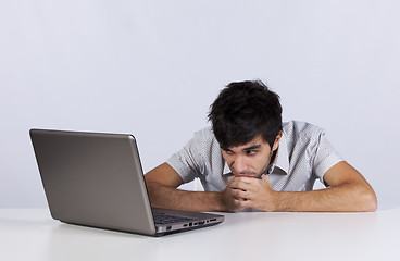 Image showing Young working with his laptop