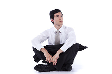 Image showing Businessman sitting on the floor