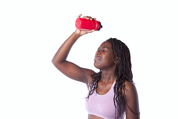 Image showing Athlete woman drinking water