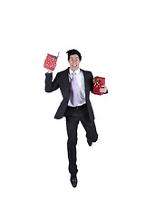 Image showing Happy businessman with christmas presents