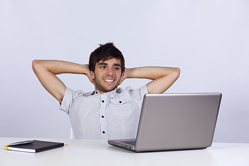 Image showing Modern businessman relaxing at his office