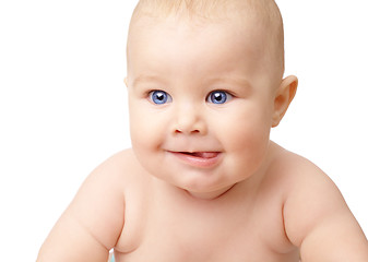 Image showing Happy toddler smiling, sticking his tongue out