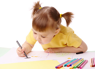 Image showing Cute child draws with felt-tip pens