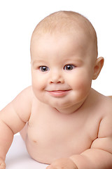 Image showing Happy toddler smiling, sticking his tongue out