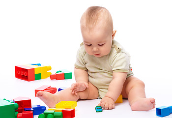 Image showing Little boy with building bricks