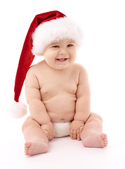 Image showing Little child wearing red Christmas cap