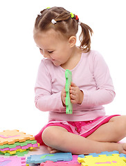 Image showing Little girl with alphabet