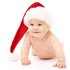 Image showing Little child wearing red Christmas cap