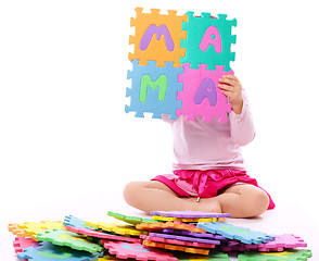 Image showing Little girl with alphabet