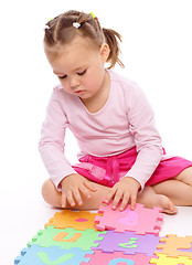 Image showing Little girl with alphabet