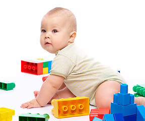 Image showing Little boy with building bricks