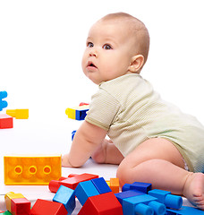 Image showing Little boy with building bricks