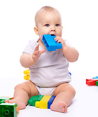 Image showing Little boy with building bricks