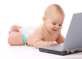 Image showing Little baby with laptop