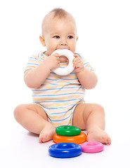 Image showing Little boy with toys