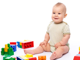 Image showing Little boy with building bricks