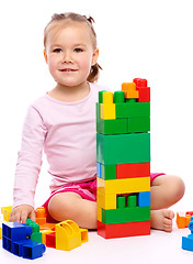 Image showing Little girl with building bricks