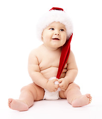 Image showing Little child wearing red Christmas cap