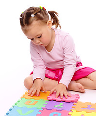 Image showing Little girl with alphabet